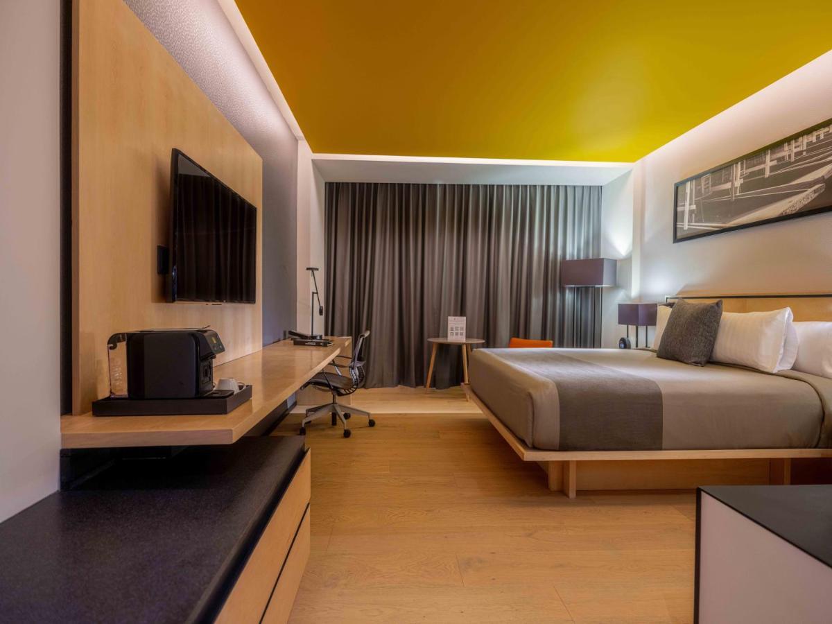 Galeria Plaza San Jeronimo Hotel เม็กซิโกซิตี้ ภายนอก รูปภาพ A room at the hotel